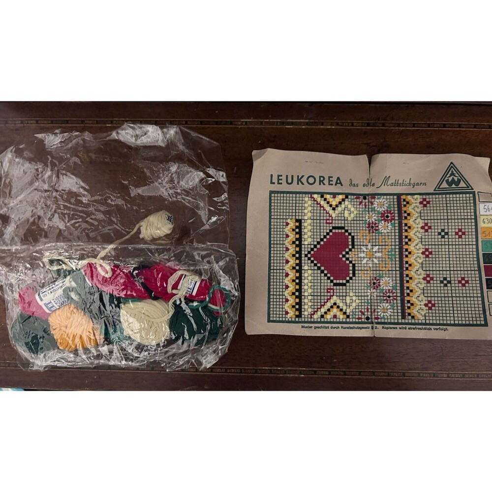 Vintage "Leukorea" cross-stitch embroidery kit featuring a heart design